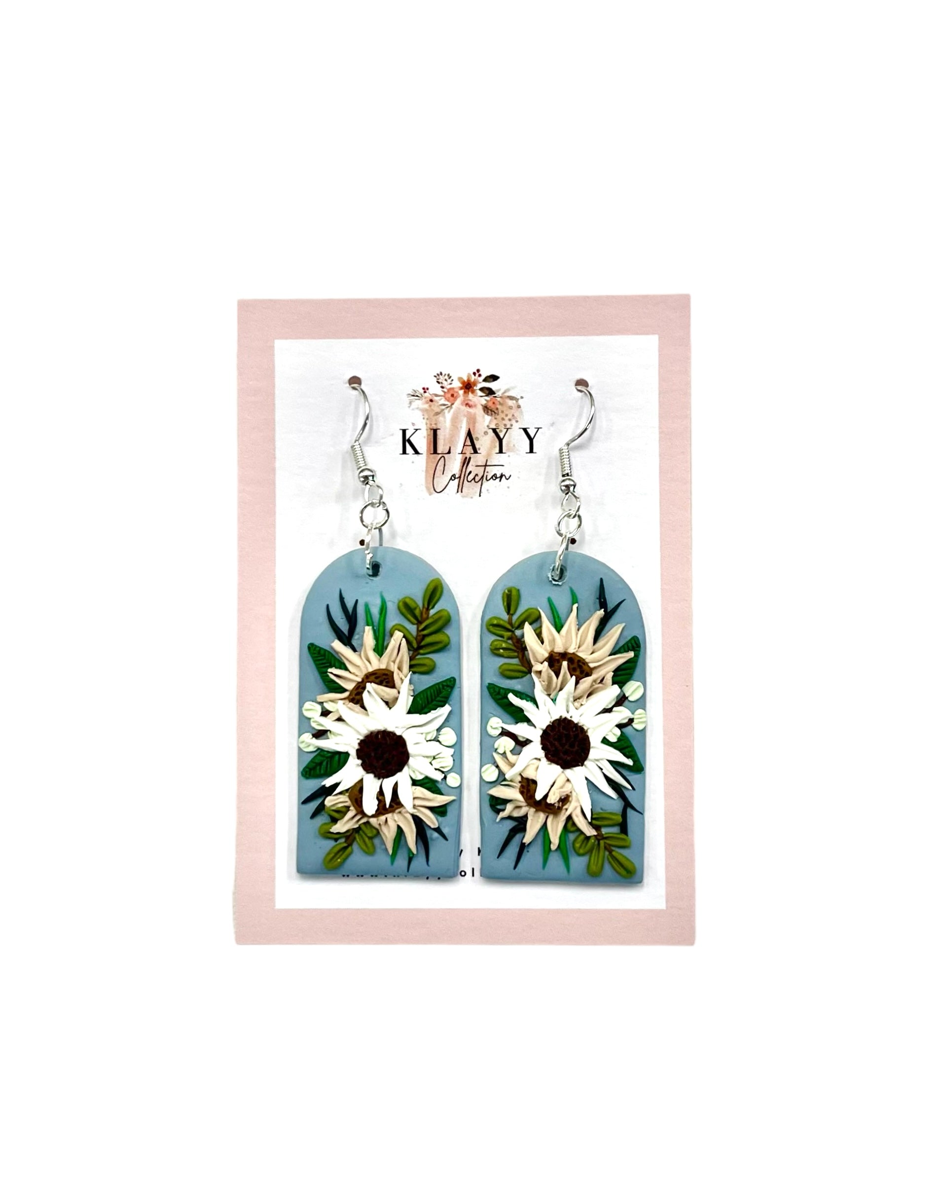 Celebrate Australian flora with Bushland Beauty earrings by Klayy Collection – handcrafted native flower dangles in soft blue tones. Lightweight & natural.