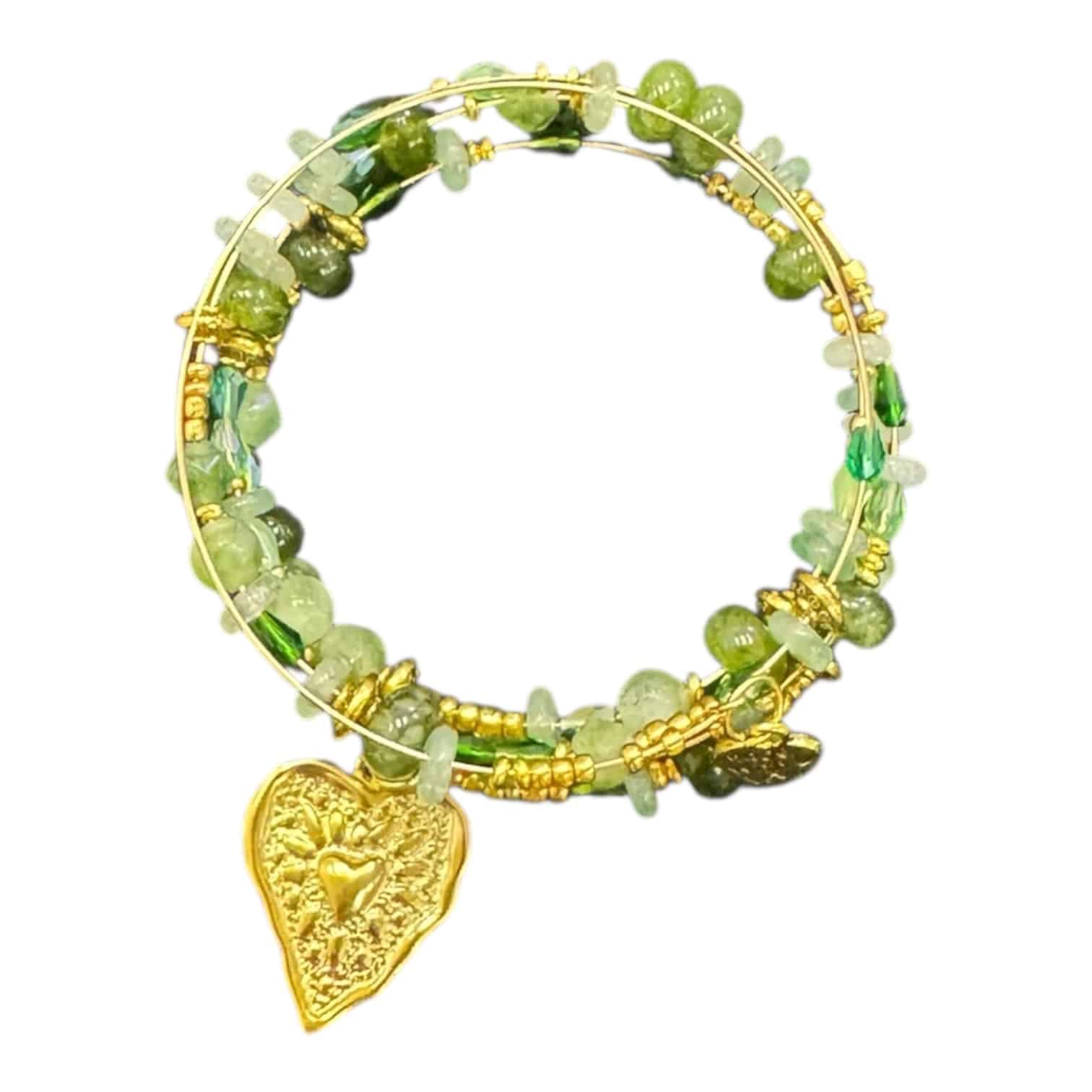 Grounded and graceful, the Heart of the Forest Bracelet glows with green stones and gold charm inspired by nature’s serenity.