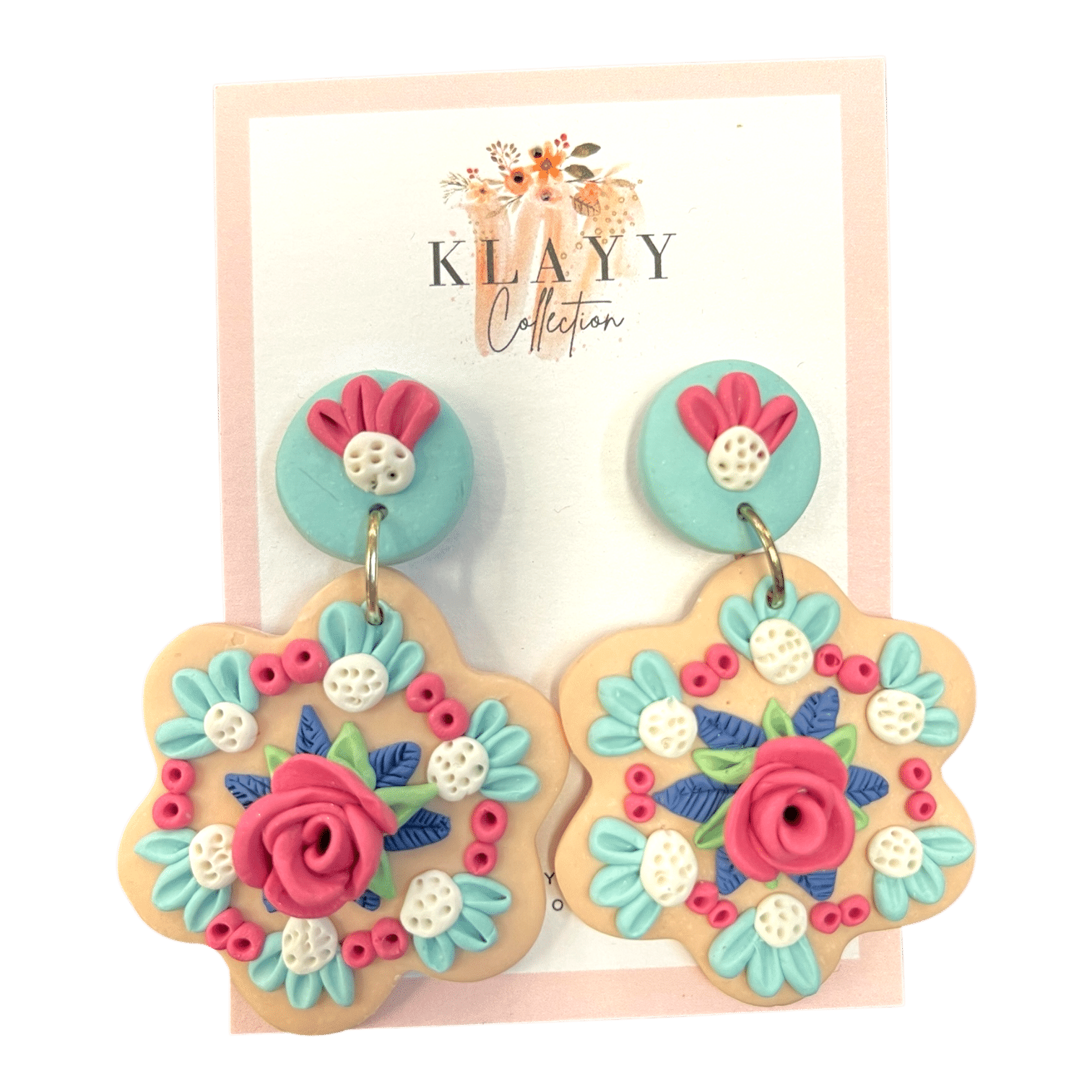 Peachy Petals earrings feature soft florals and pastel tones with central roses on a peach clay base. Handmade sweetness.
