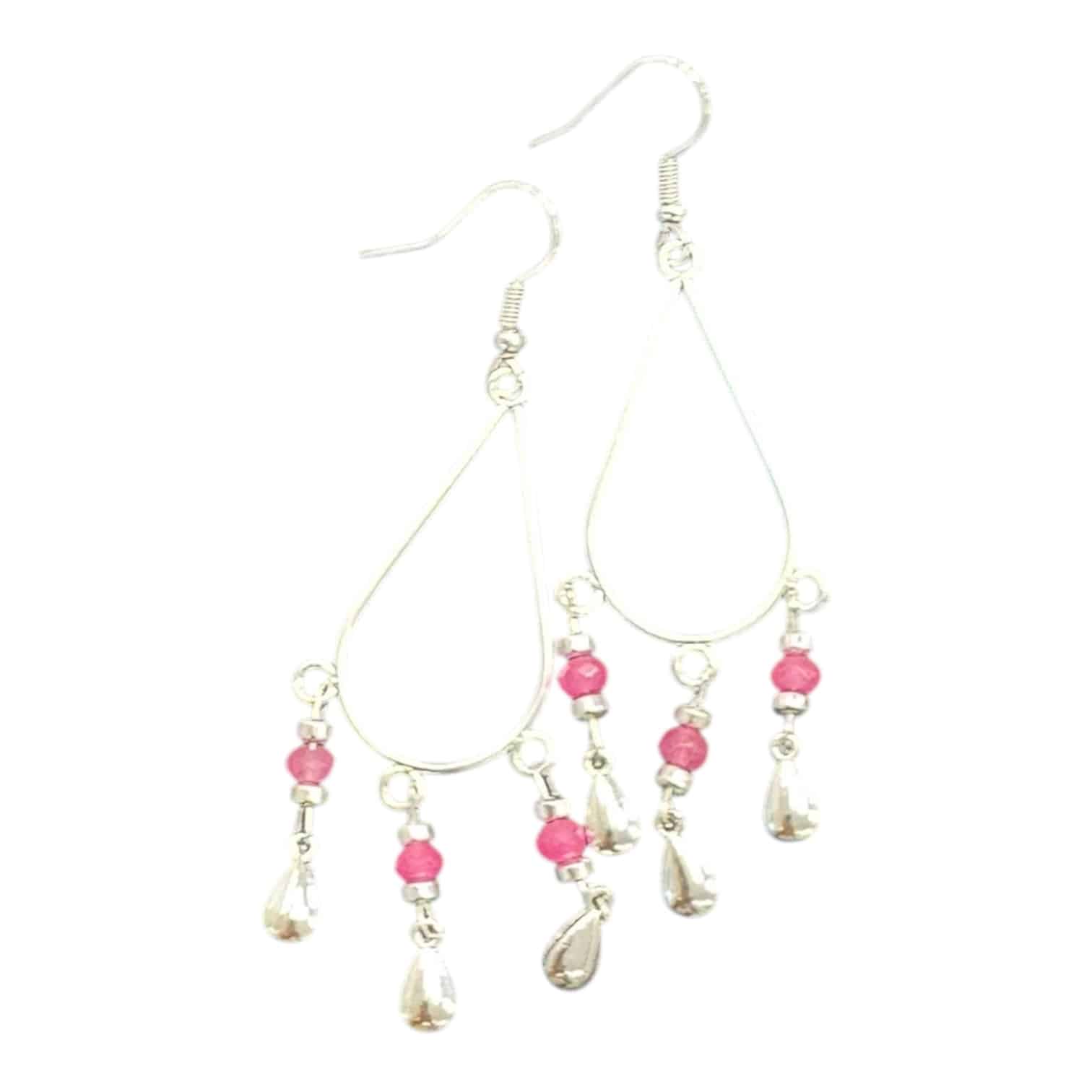 Full of pink sparkle and playful charm, the Sweet Like Candy Drops by Art in Stone add a pop of joy to any outfit.