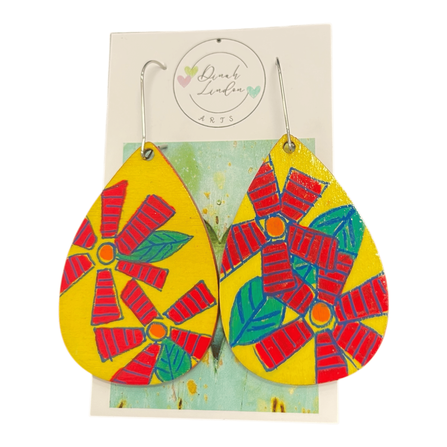 Sunburst Pinwheel Teardrops – bold yellow earrings with red floral pinwheel designs, handpainted and sealed for shine.