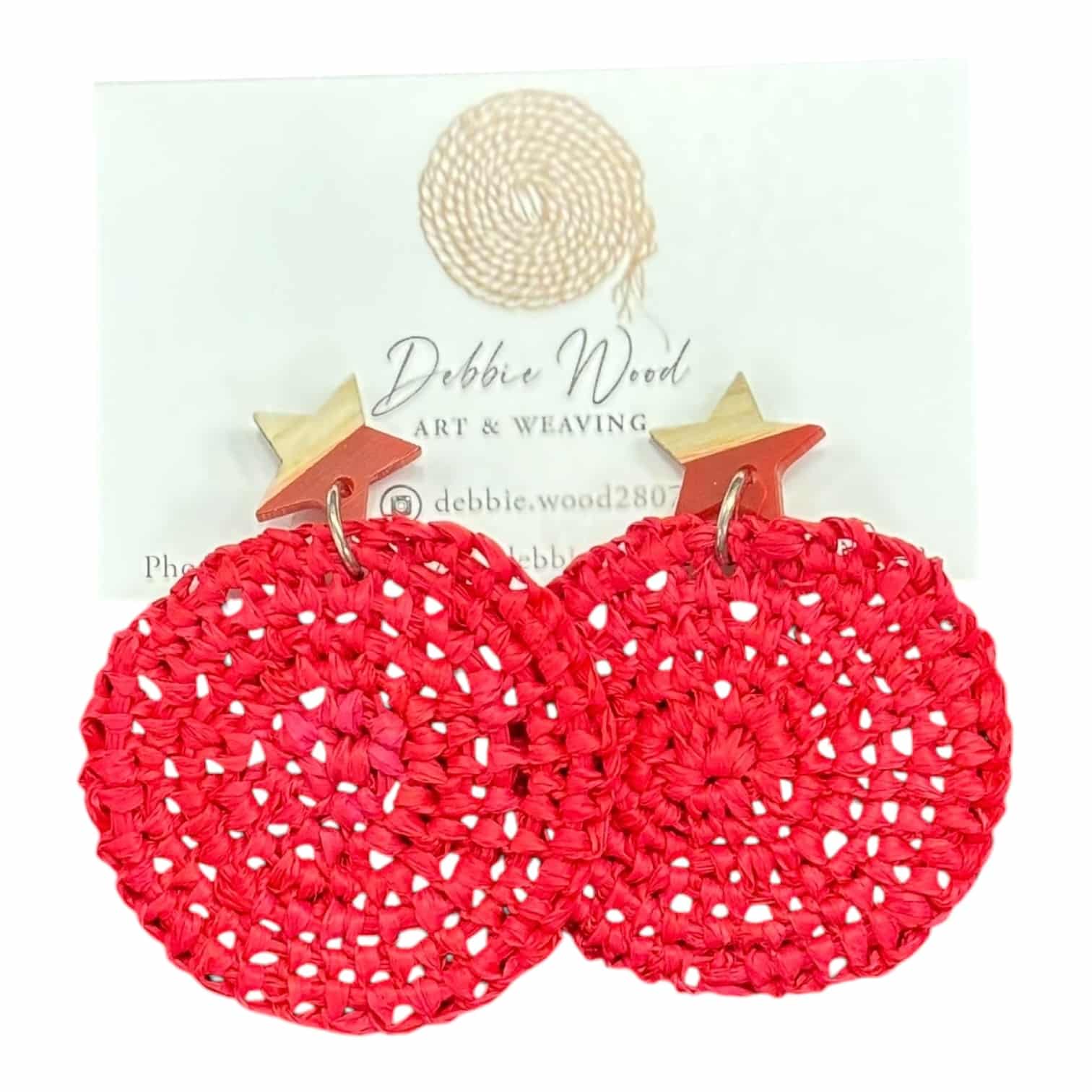 Starburst Red handwoven earrings by Gomeroi artist Debbie Wood. Red raffia and wooden stars combine for a bold, playful statement piece.