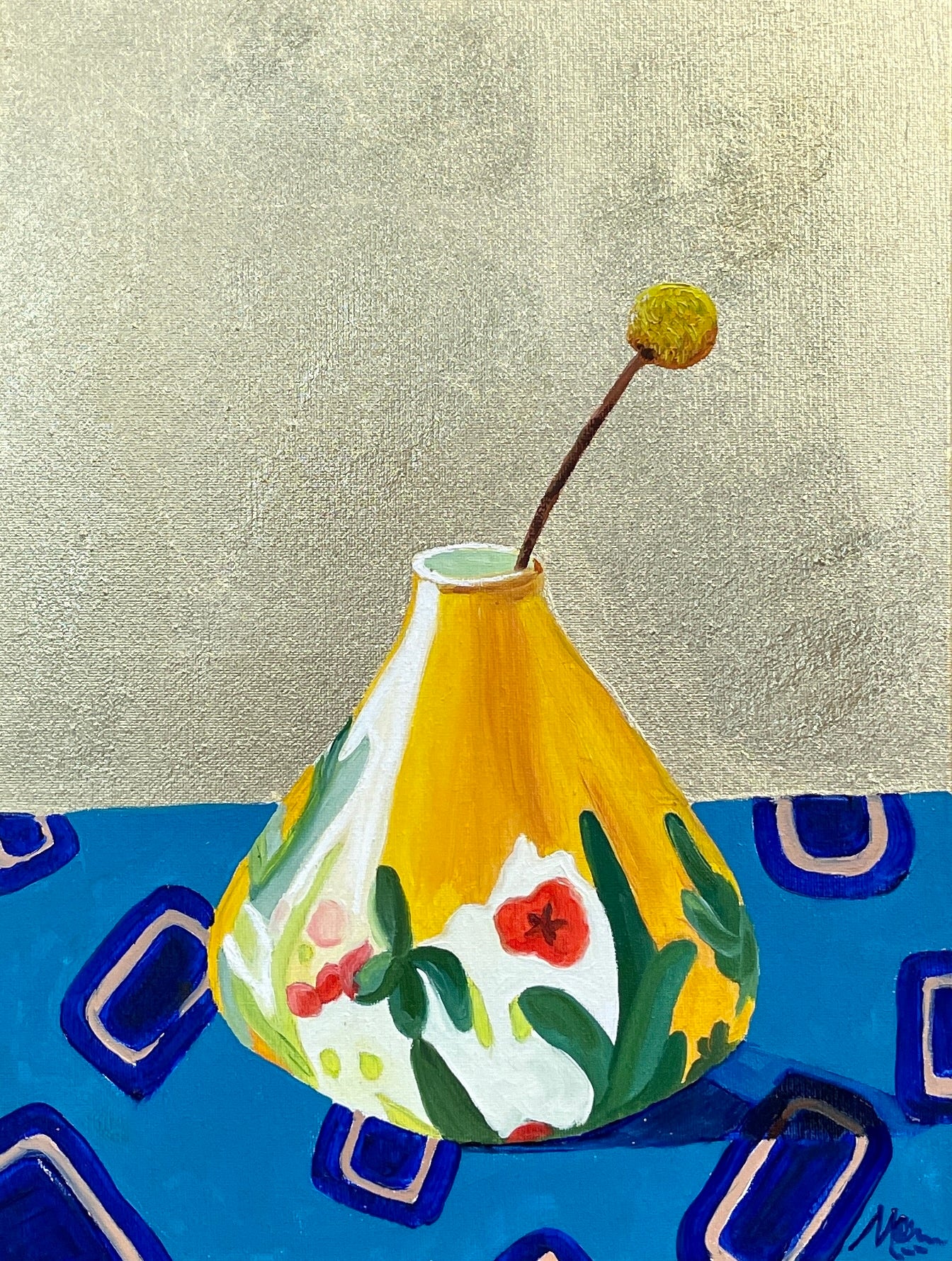 "Golden Series – Katelyn" by Maggie Deall is a minimalist still life featuring a floral vase on a blue tablecloth, set against gold leaf. Framed in oak.