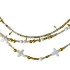 Handmade Celestial Cross Necklace featuring mother-of-pearl cross beads, shimmering seed beads, and gold accents by Art In Stone Jewellery.