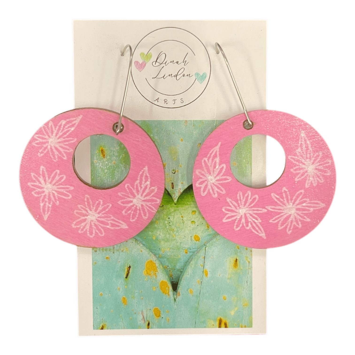 Bubblegum Blossom Hoops – pink hoops with delicate white floral designs, handpainted on lightweight wood by Dinah Lindon.