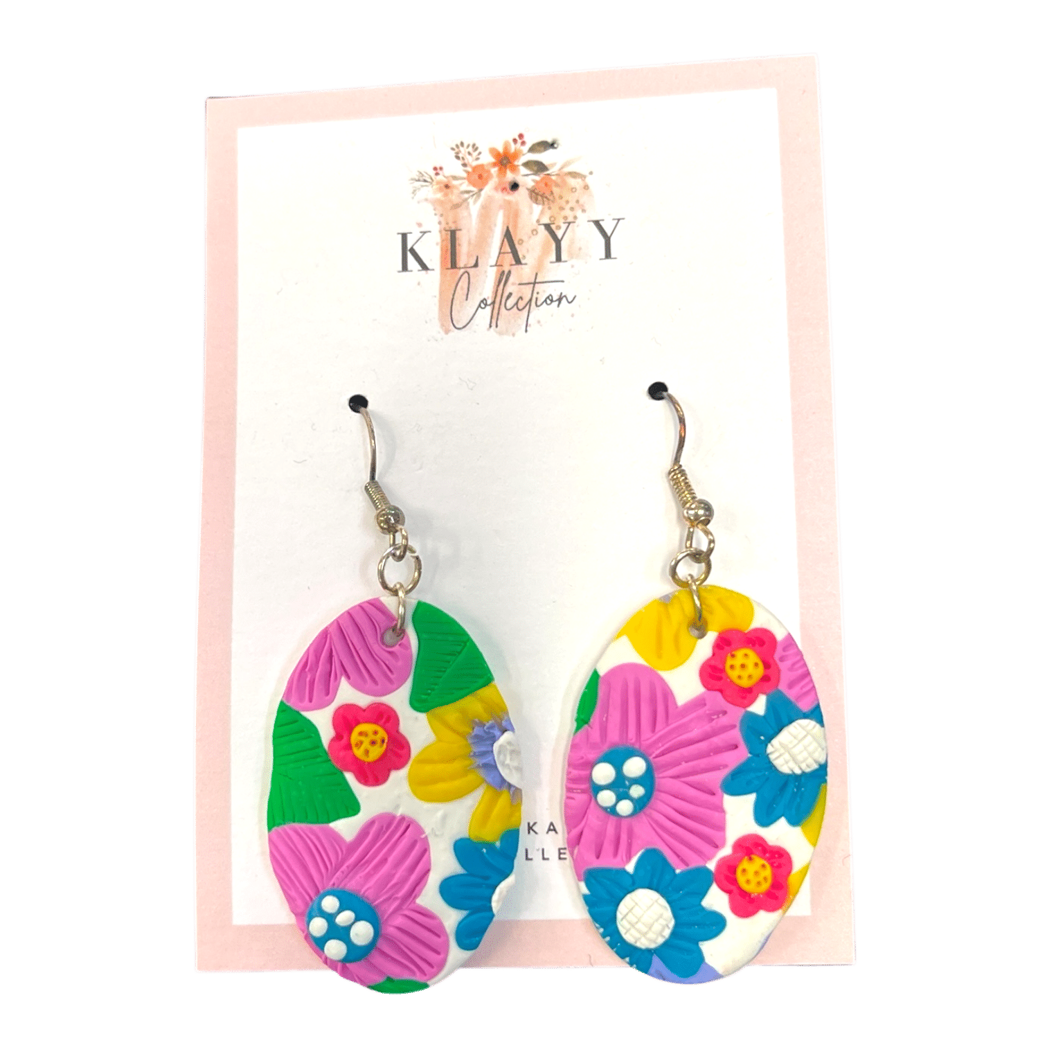 Petal Pop earrings are bold, bright ovals bursting with colourful floral detail. Retro flair meets modern fun. Lightweight and handmade.