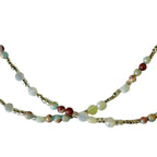 The Whispering Sands Necklace by Art In Stone Jewellery features Amazonite gemstones, soft neutrals, and sterling silver accents, inspired by desert tones.