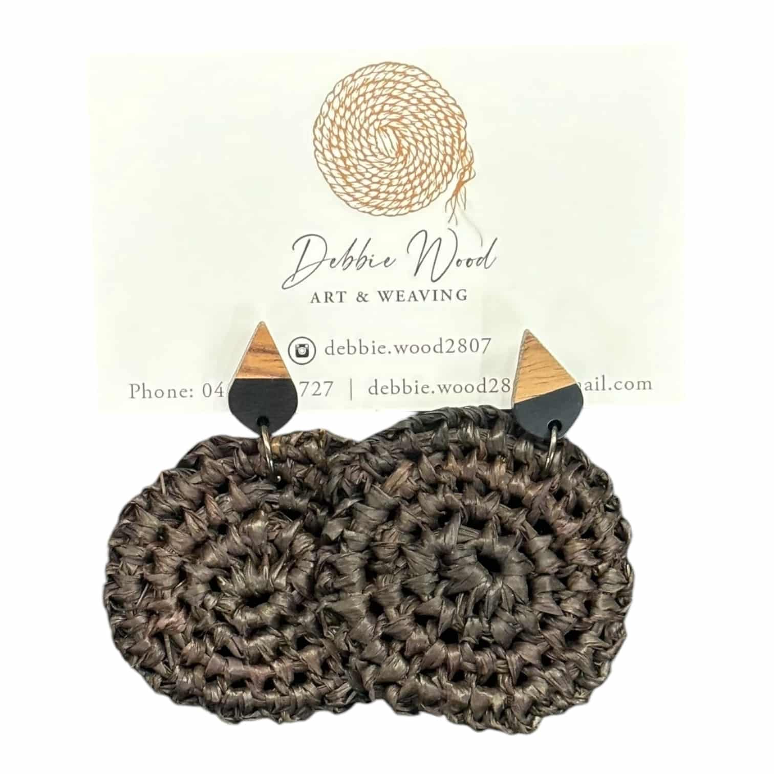 Midnight Shadows handwoven earrings by Gomeroi artist Debbie Wood. Dark raffia earrings with a dramatic, moody appeal.