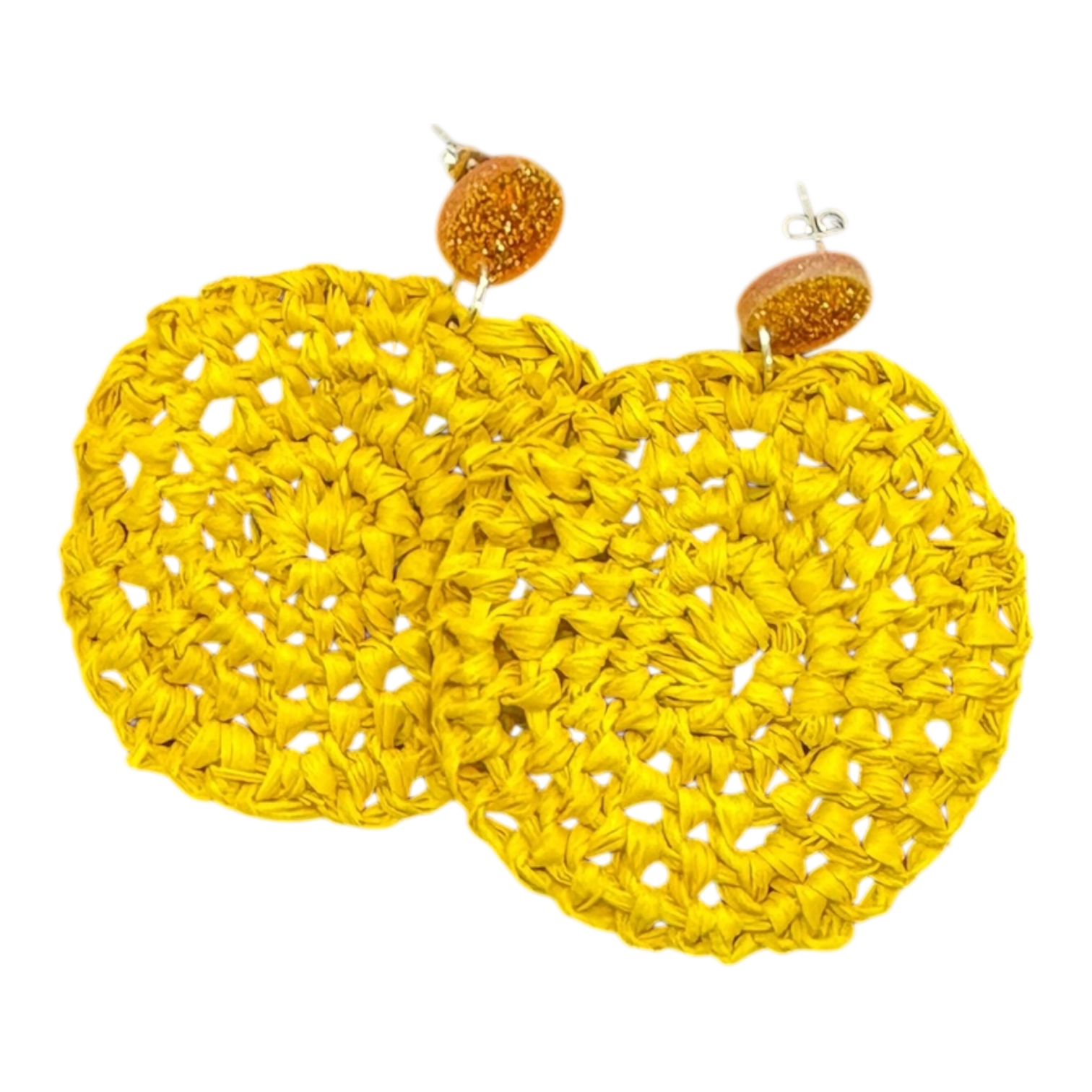 Handwoven golden raffia earrings with ochre studs by Gomeroi artist Debbie Wood. Lightweight cultural jewellery.
