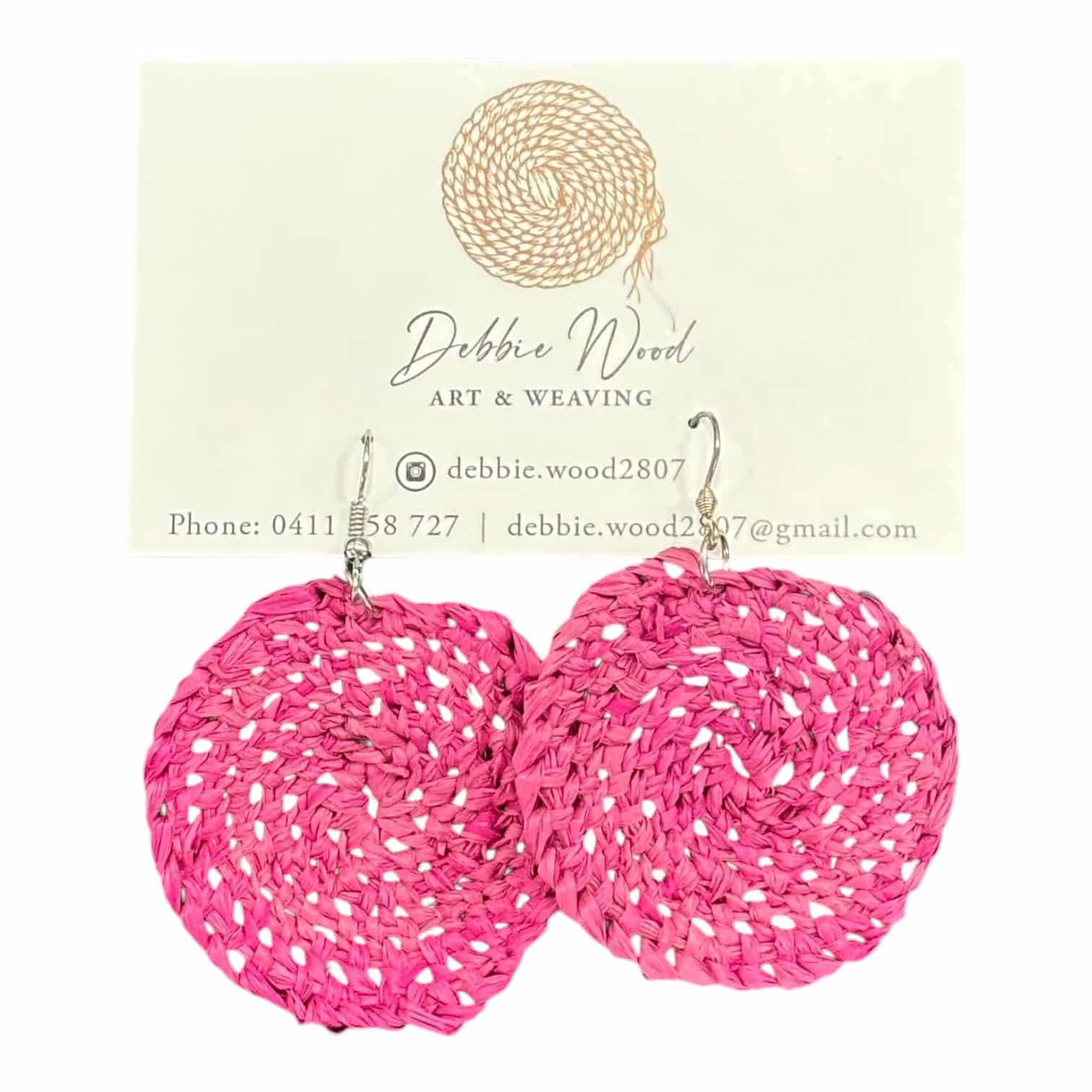 Pink Breeze handwoven earrings by Gomeroi artist Debbie Wood. Vibrant pink raffia adds a playful, bold touch to your look.