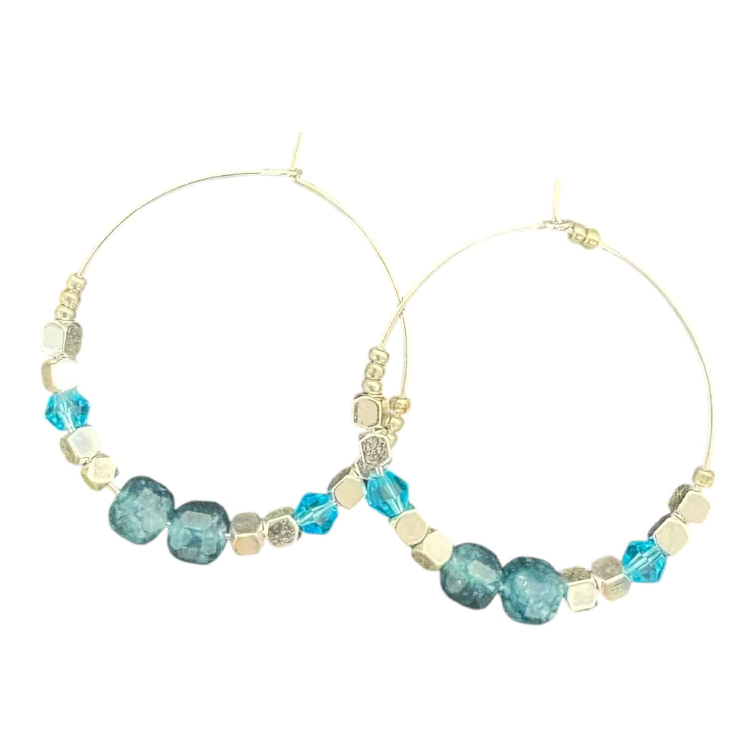 Crystal Reef Hoops by Art in Stone — handmade hoop earrings with blue crystals and silver accents. Shimmering, fresh, and unique!