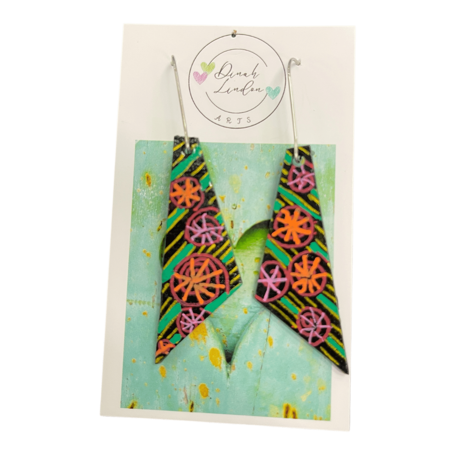 Carnival Whirl Arrows – black arrow earrings with neon floral bursts and stripe detailing, handpainted and gloss sealed.