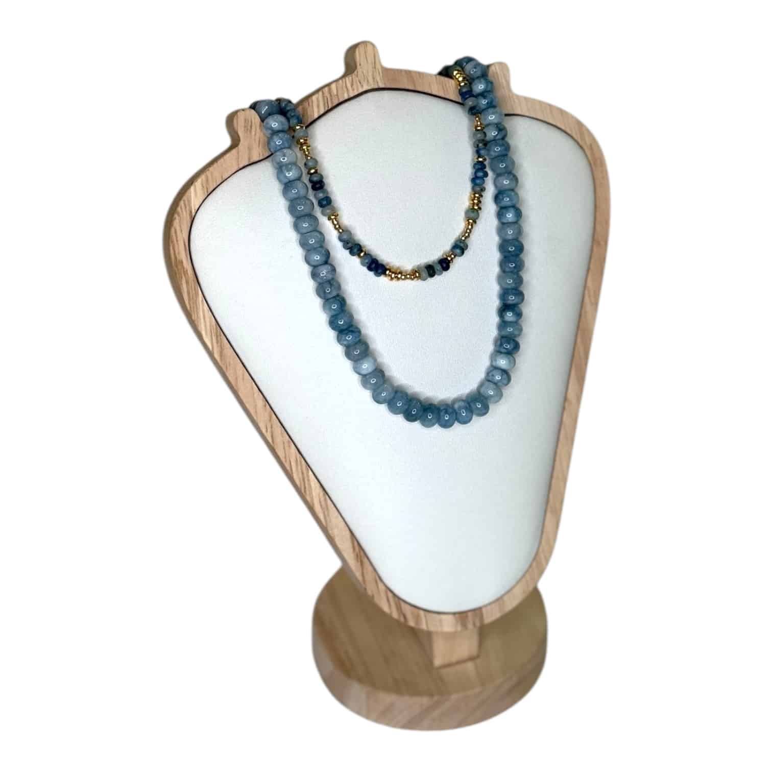The Midnight Waves Necklace by Art In Stone Jewellery features sodalite, aquamarine, and gold-plated beads, inspired by the beauty of the ocean.