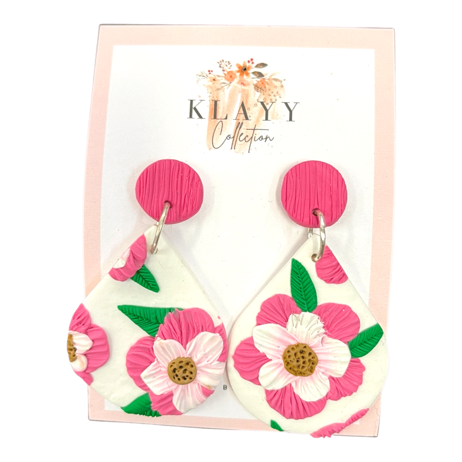 Petal Parade earrings feature bright florals on crisp white with pink textured studs. Fresh, floral, and handcrafted.