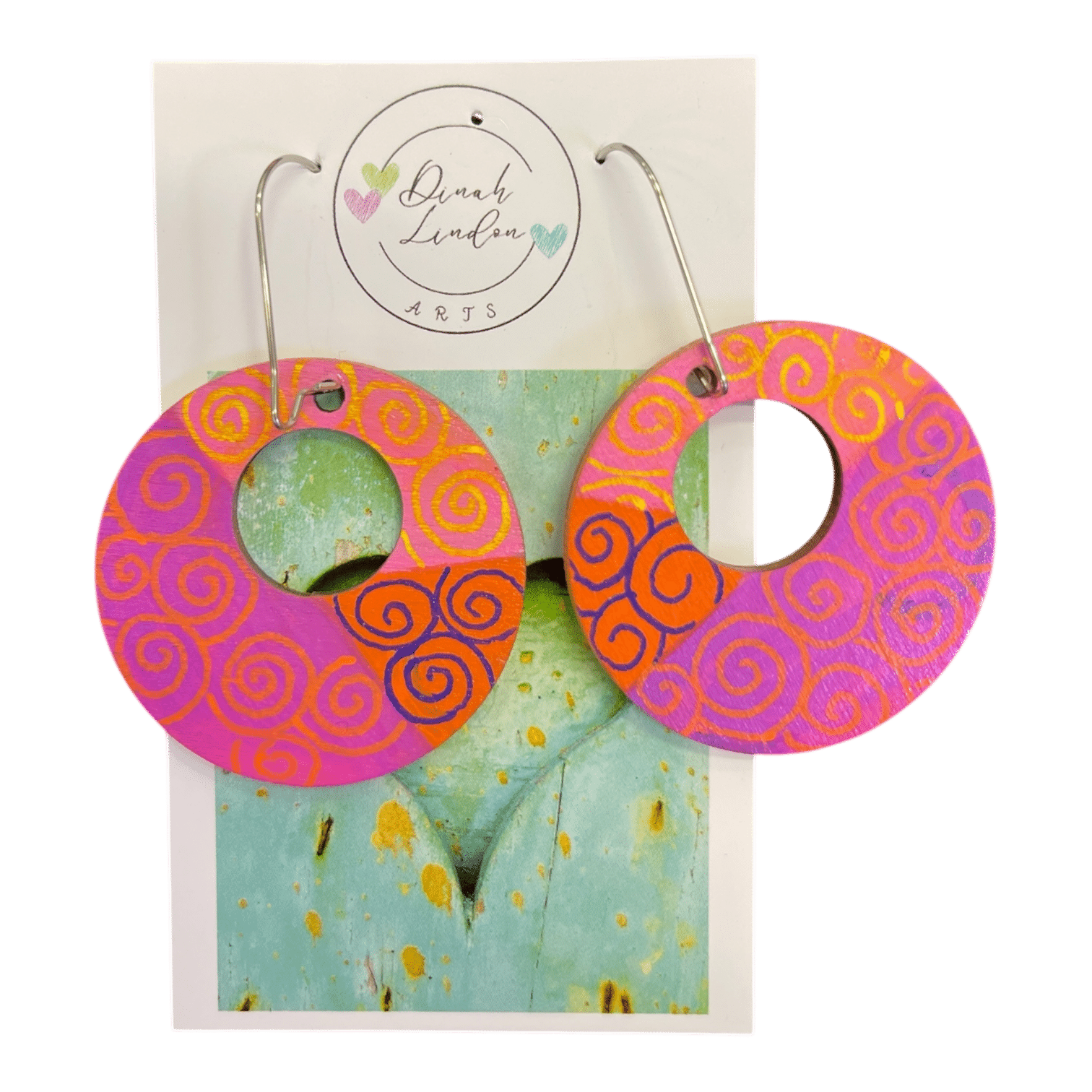 Sunset Spiral Hoops – handpainted hoops in pink and orange with swirling details and high-gloss finish.