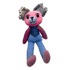 Poppy Patch Teddy is a vibrant patchwork teddy bear made from handwoven alpaca and merino wool with love by Ashculme Textiles.