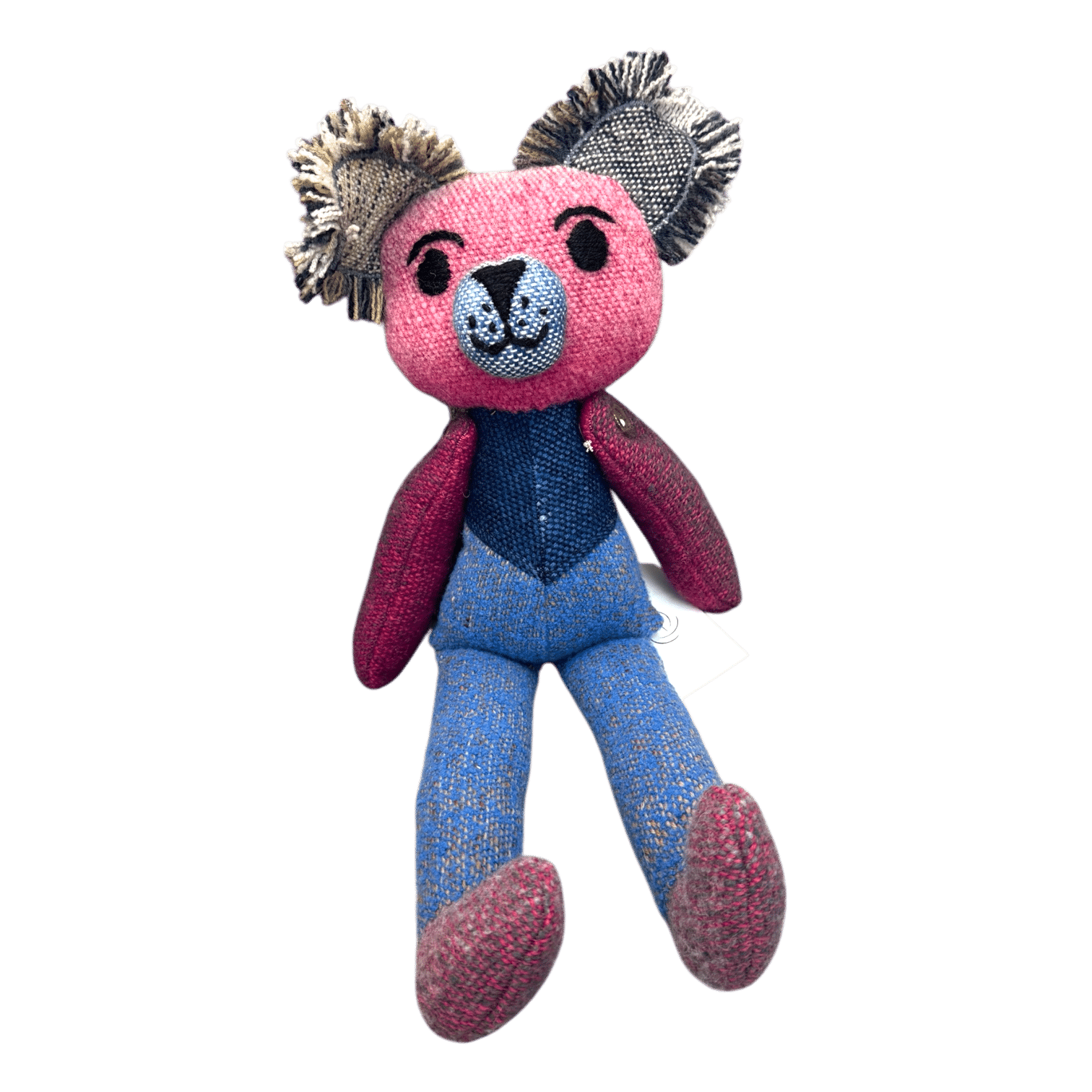 Poppy Patch Teddy is a vibrant patchwork teddy bear made from handwoven alpaca and merino wool with love by Ashculme Textiles.