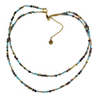 The Earth & Sky Necklace by Art In Stone Jewellery features jasper, sky-blue beads, and gold accents, embodying the balance of nature’s elements.