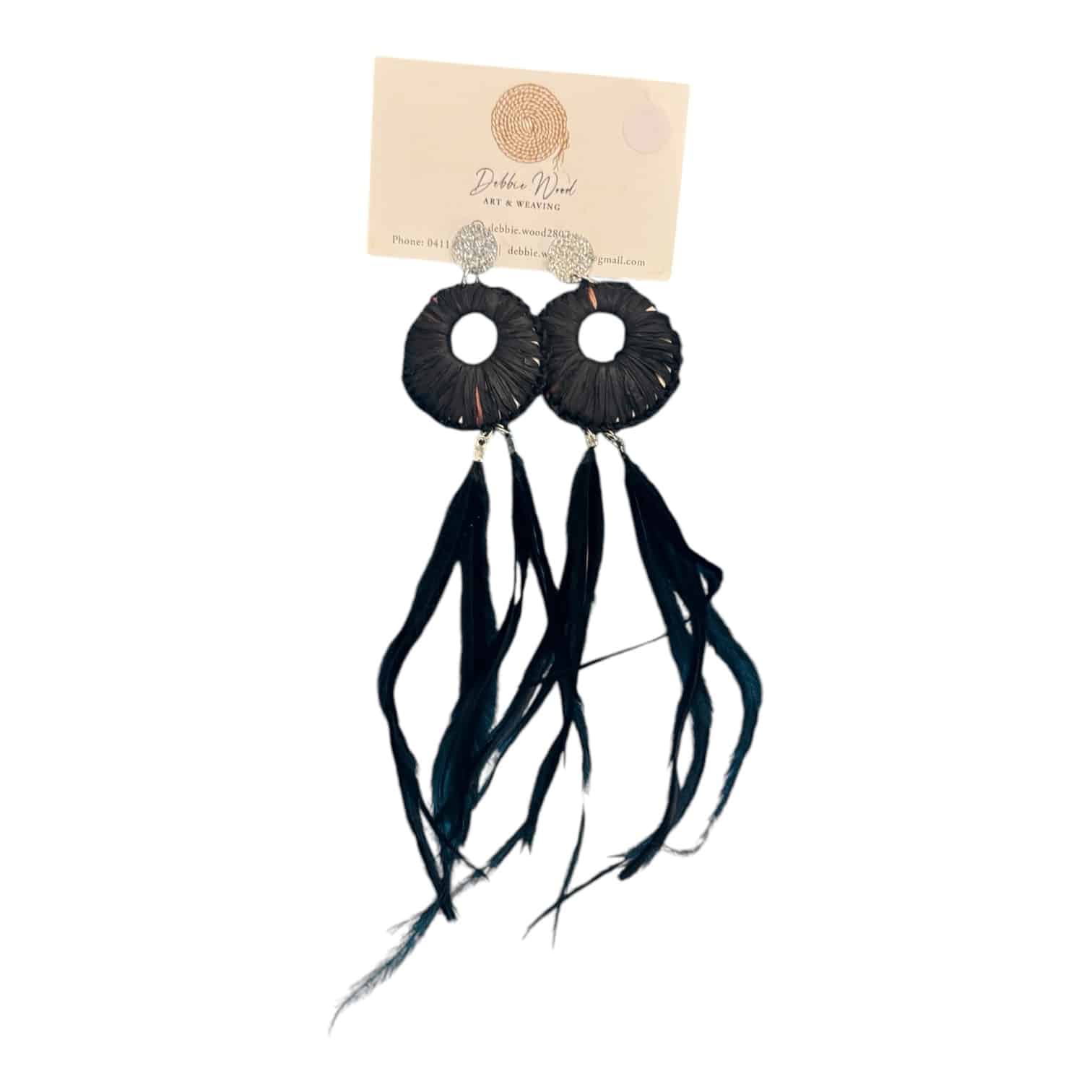 Twilight Elegance earrings by Gomeroi artist Debbie Wood. Charcoal raffia and black Emu feathers. Timeless, handcrafted sophistication.