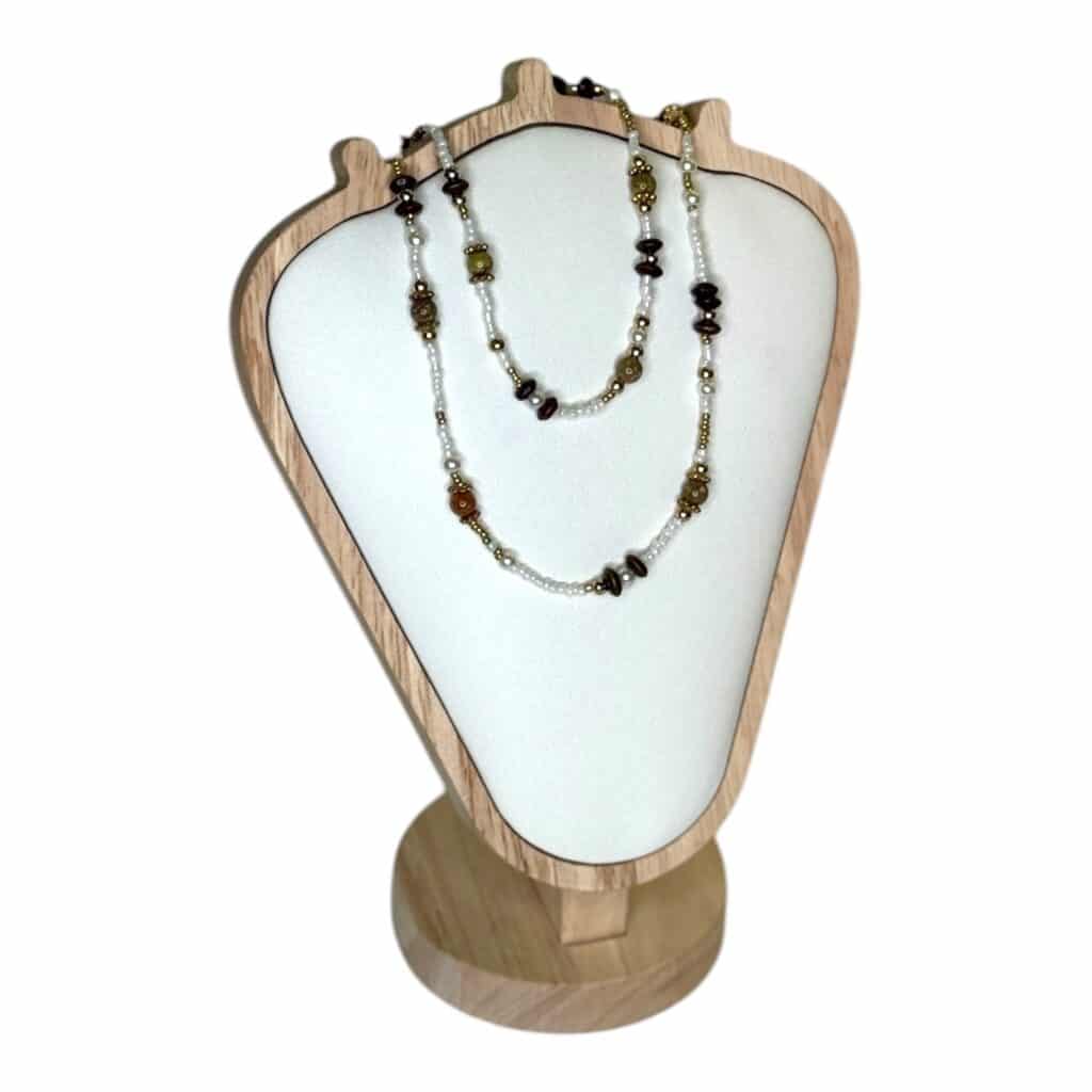 The Midnight Ember Necklace by Art in Stone Jewellery is a handmade double-strand piece featuring onyx, amber, and smoky quartz gemstones, accented with gold and pearls—perfect for elegant layering.
