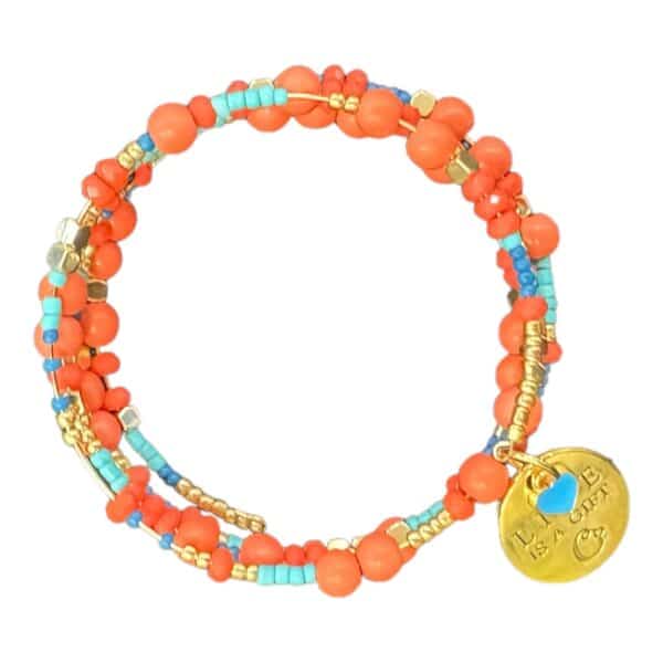 Celebrate life with the handmade "Life Is a Gift" memory wire bracelet, featuring coral and turquoise gemstones, crystals, and a gold-plated charm. A vibrant reminder to cherish every moment.