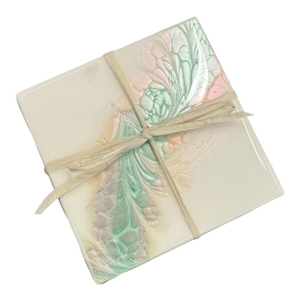 Discover the Pink and Green Floral Porcelain Coaster by May & Me, hand-poured artistry perfect for protecting surfaces and enhancing home decor with elegance.