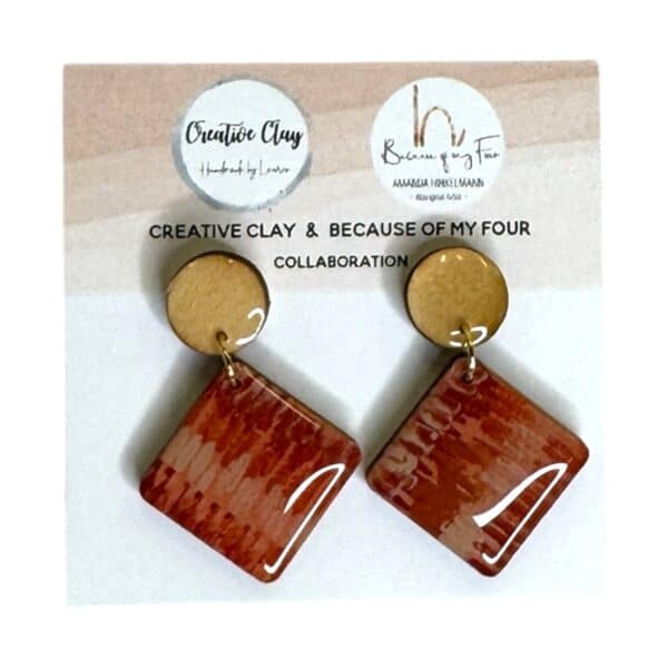 Miimi 20mm Square Dangle 6 earrings feature Amanda Hinkelmann’s brushstroke design in resin. Handmade in collaboration with Creative Clay.
