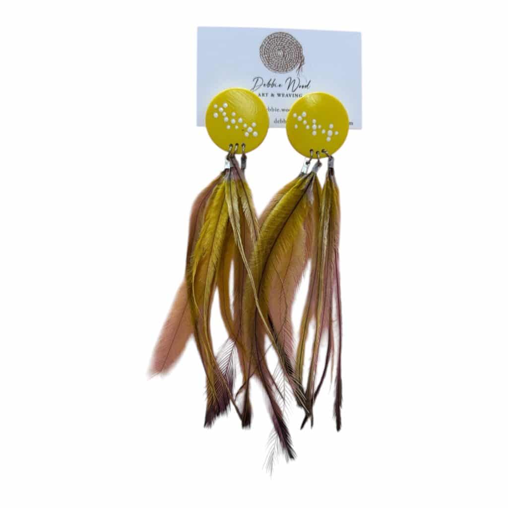 Golden Plains Earrings by Debbie Wood – hand-painted yellow studs with ethically sourced ochre-toned feathers.