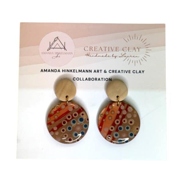 Malayarr 30mm Round Statement 1 earrings feature Amanda Hinkelmann’s vibrant circle artwork in resin, handmade by Creative Clay.