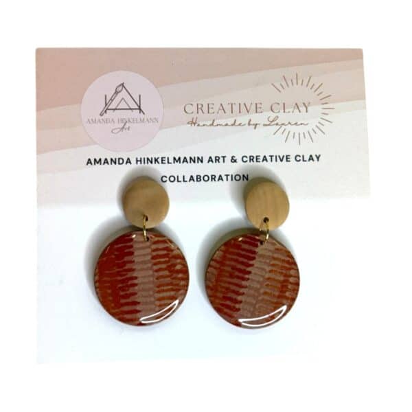 Malayarr 30mm Round Statement 15 earrings feature Amanda Hinkelmann’s brushstroke design in warm tones, handmade in resin by Creative Clay.
