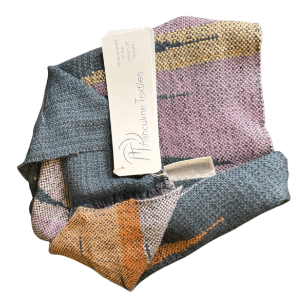 Wrap yourself in the colours of the bush with this handwoven merino and alpaca cowl in dusky mauve and golden ochre tones.