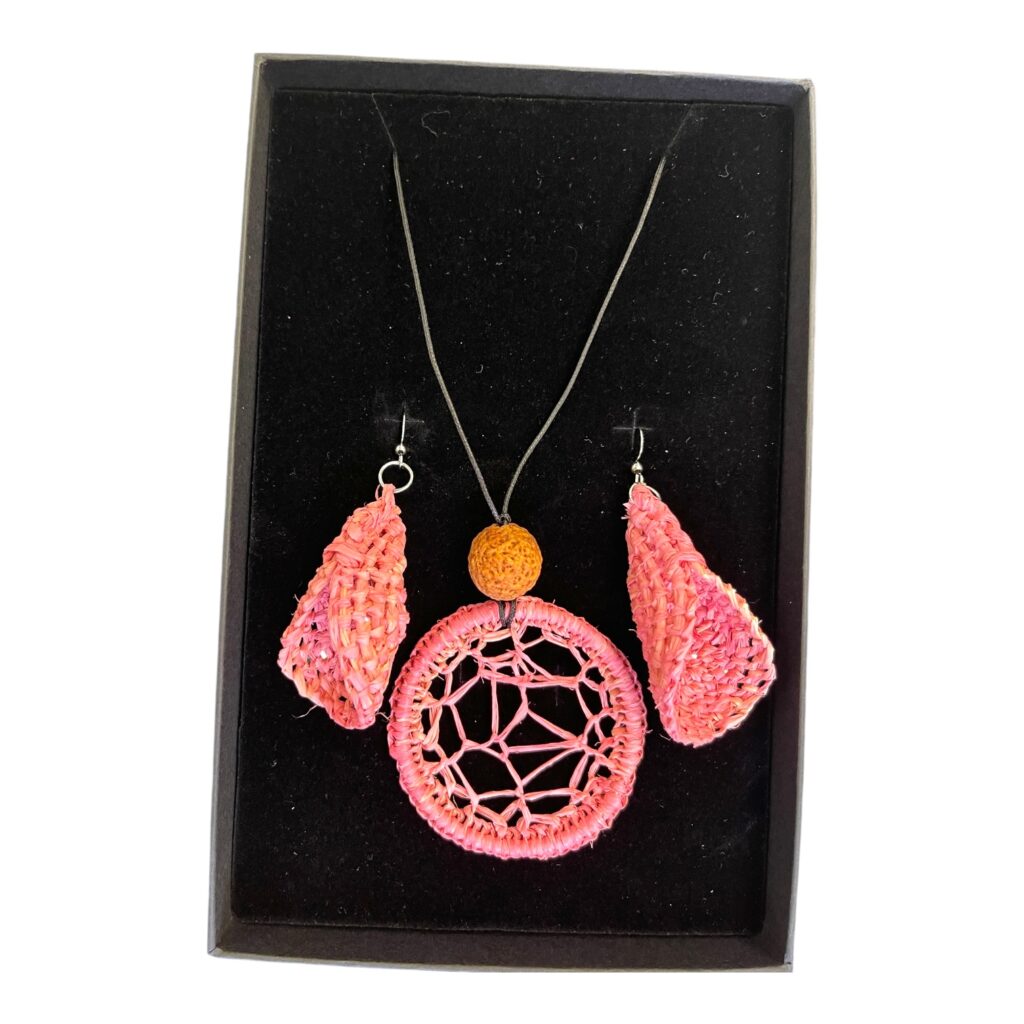 Desert Rose Jewellery Set – Handwoven pink raffia necklace and earrings by Gomeroi artist Debbie Wood, inspired by desert flowers.
