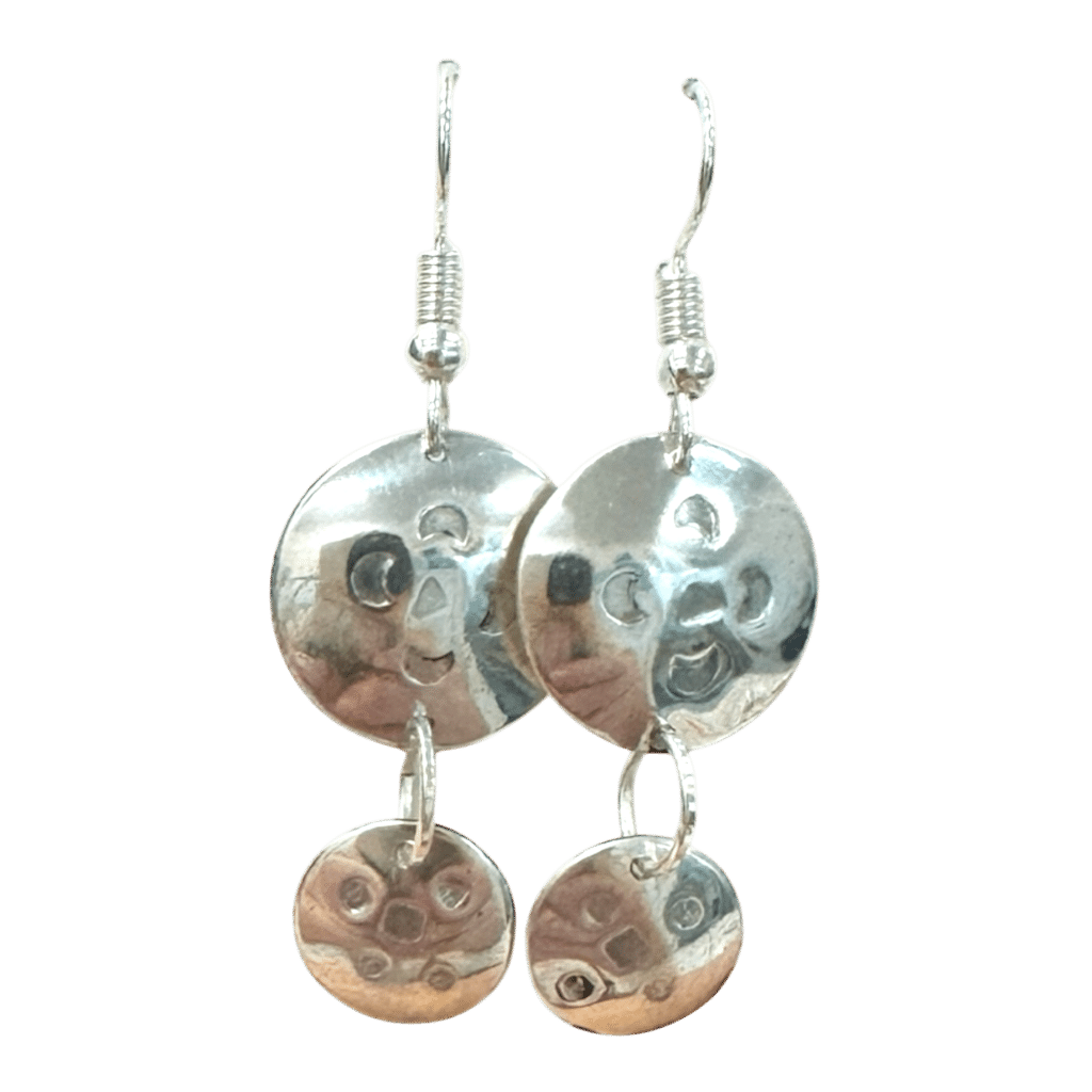 Moon Rhythm Earrings by Kevin Sterling – handcrafted silver drop earrings featuring domed discs with textured, lunar-inspired impressions.
