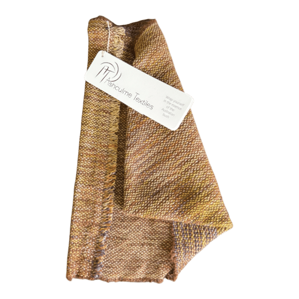 Rust and ochre-toned handwoven cowl in merino and alpaca. Naturally dyed and inspired by the golden light of the bush.