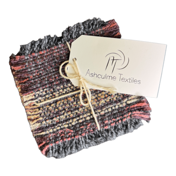 Mulberry Mist - lilac and mulberry handwoven coasters made from alpaca and merino wool. Naturally dyed and crafted with care.