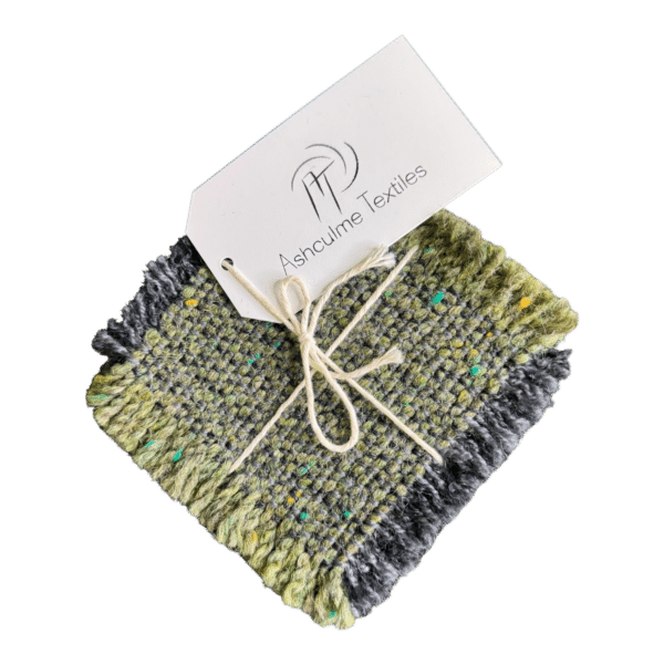 Speckled green and grey coasters in alpaca-merino wool. Handwoven and naturally dyed using foraged plants. Set of four.