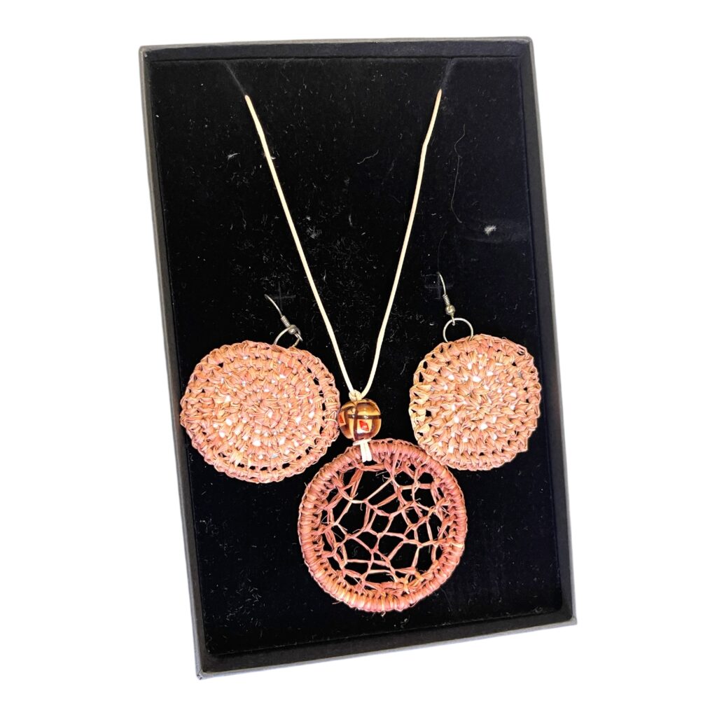 Clay Whisper – Soft terracotta handwoven dreamcatcher-style raffia set by Debbie Wood, rooted in calm and connection.