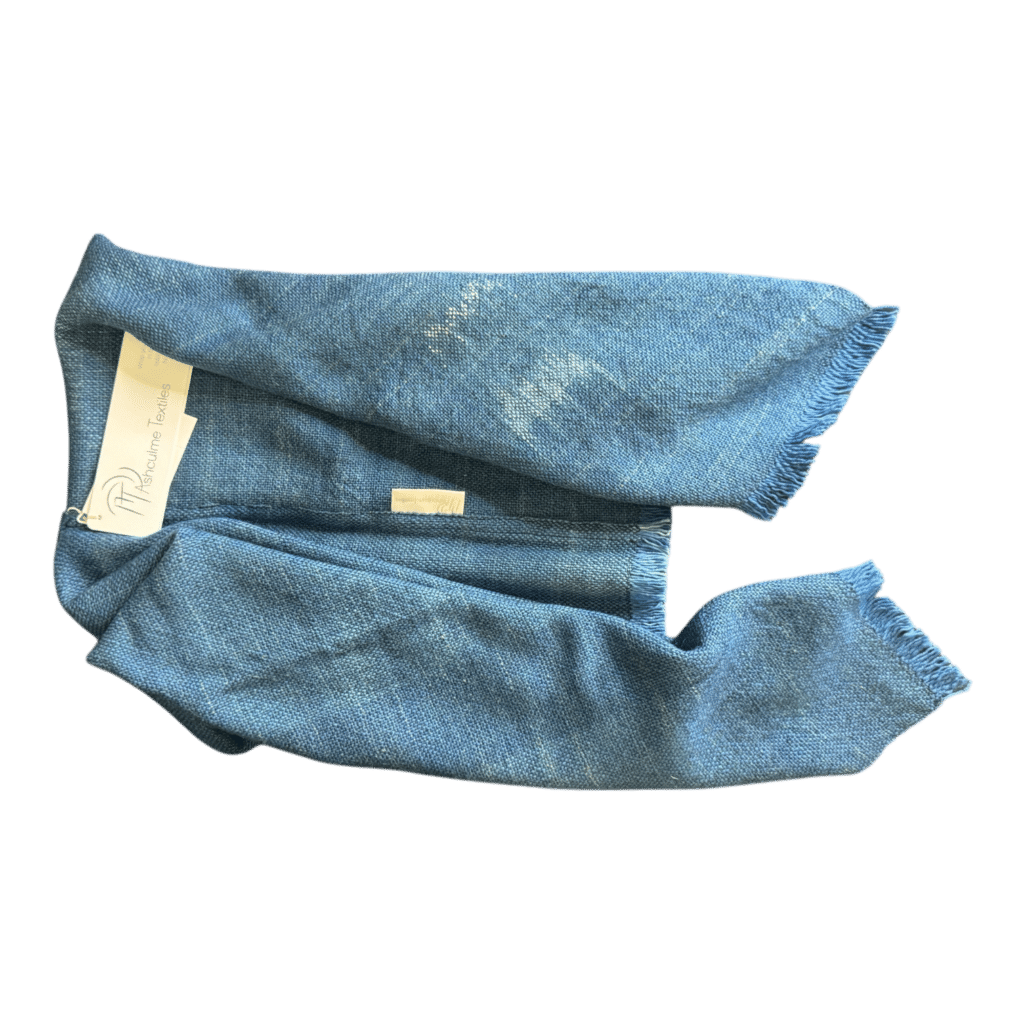 Light blue handwoven poncho Cloudline - in soft merino and alpaca. Naturally dyed and cosy, inspired by open skies and slow living.
