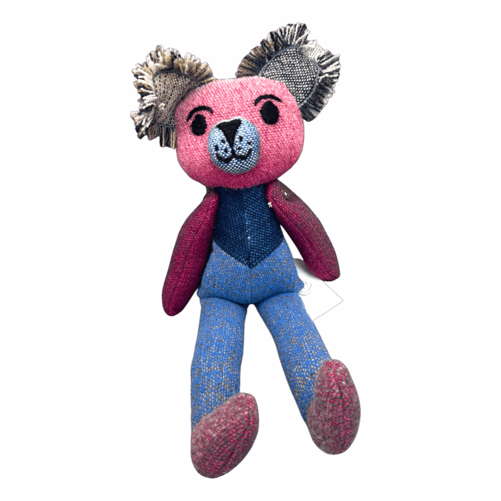 Poppy Patch Teddy is a vibrant patchwork teddy bear made from handwoven alpaca and merino wool with love by Ashculme Textiles.