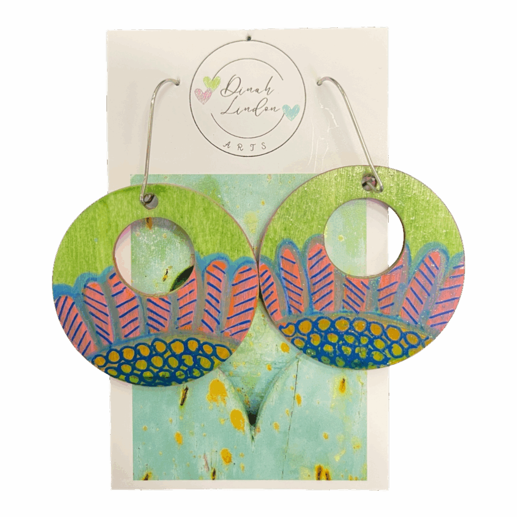 Sugarleaf Hoops – round earrings with pink leaves and navy-gold dots on a green background, handpainted and gloss sealed.