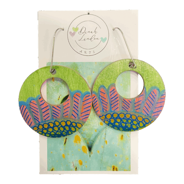 Sugarleaf Hoops – round earrings with pink leaves and navy-gold dots on a green background, handpainted and gloss sealed.