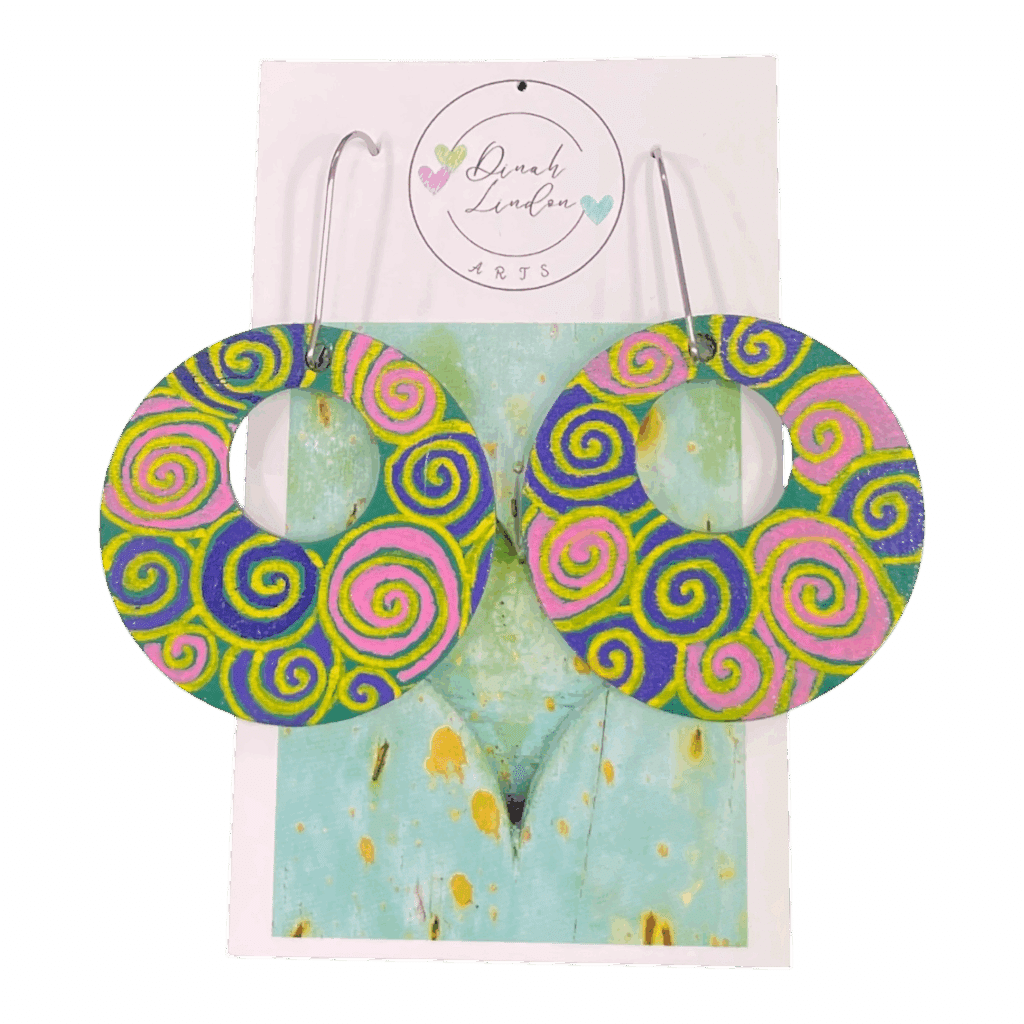 Neon Spiral Disco Hoops – bold round earrings with handpainted spirals in pink, yellow, and purple. by Dinah Lindon Artist.