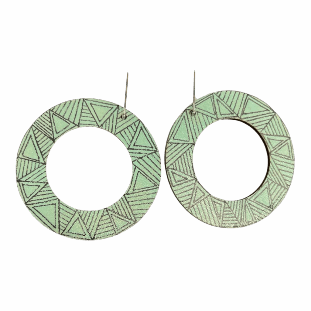 Minted Maze Hoops – mint green round earrings with etched geometric line and triangle patterns.