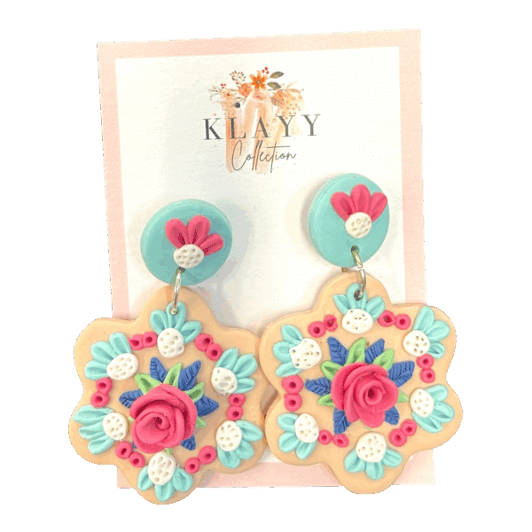 Pastel Posy earrings are sweet scalloped florals with roses, mint leaves, and soft pastels. Handmade polymer clay charm with a playful twist.