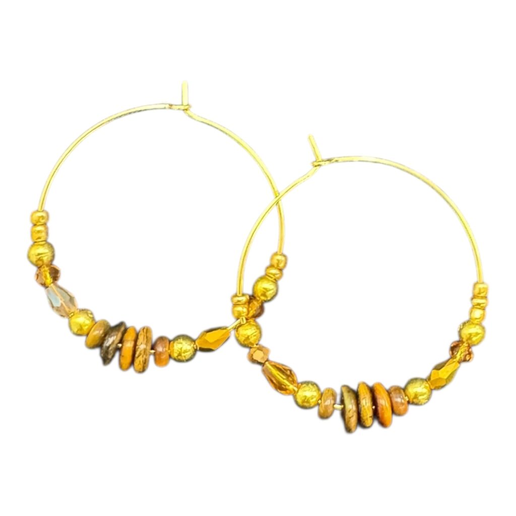 Amber Glow Hoops by Art in Stone — handmade gold and amber beaded hoop earrings with crystal detail for elegant, glowing everyday style.