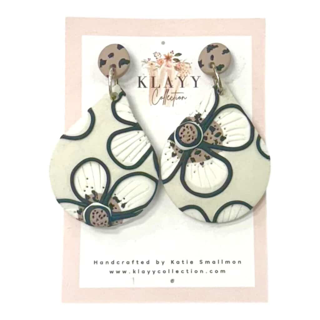 Handmade Wildflower Whisper Earrings by Klayy Collection — black and white floral polymer clay teardrop earrings with timeless elegance.