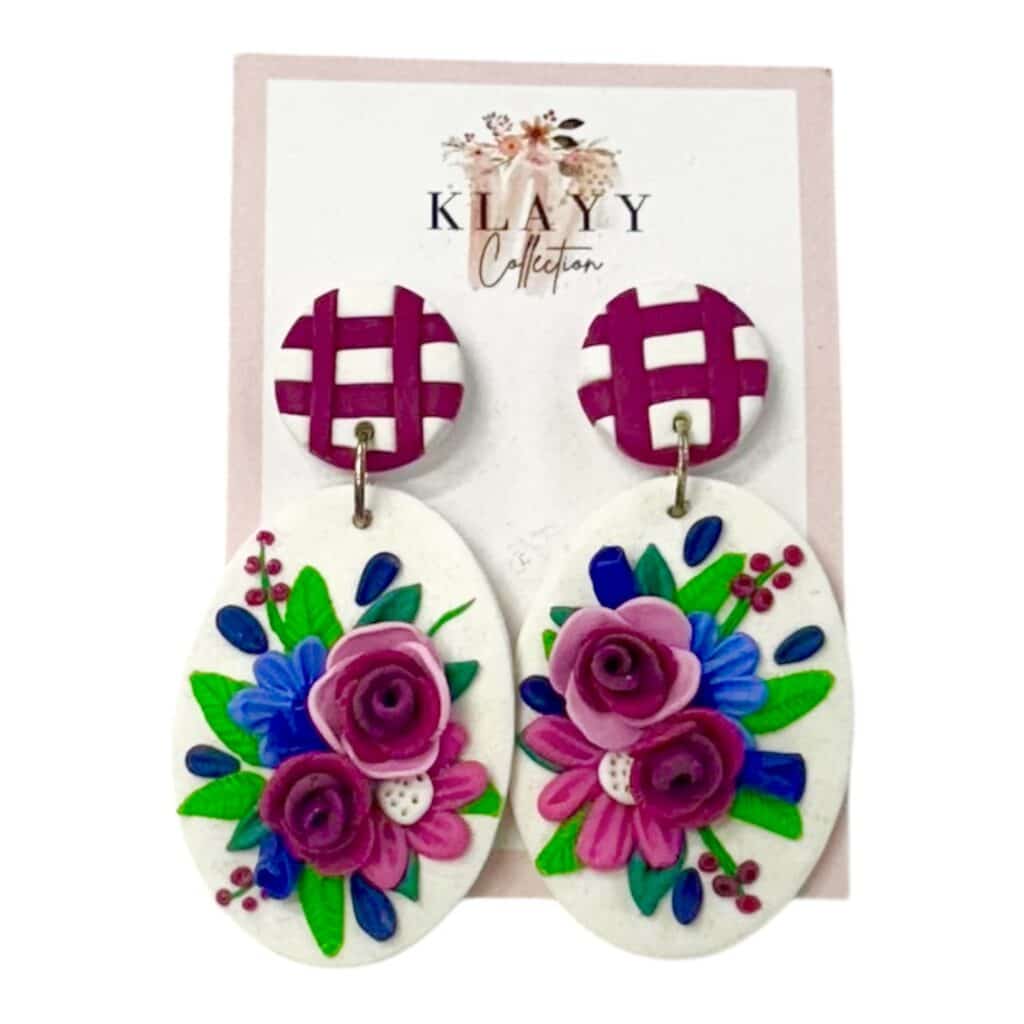 Handmade Petal Parade Earrings by Klayy Collection — bold floral polymer clay earrings with pink lattice tops and vibrant blooms.