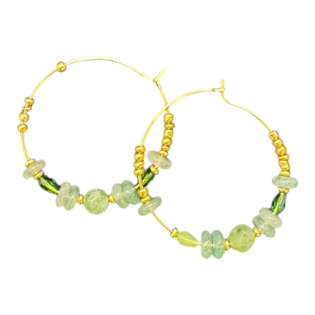Meadowlight Hoops by Art in Stone — handmade green and gold crystal hoop earrings inspired by nature’s calm and fresh spring tones.