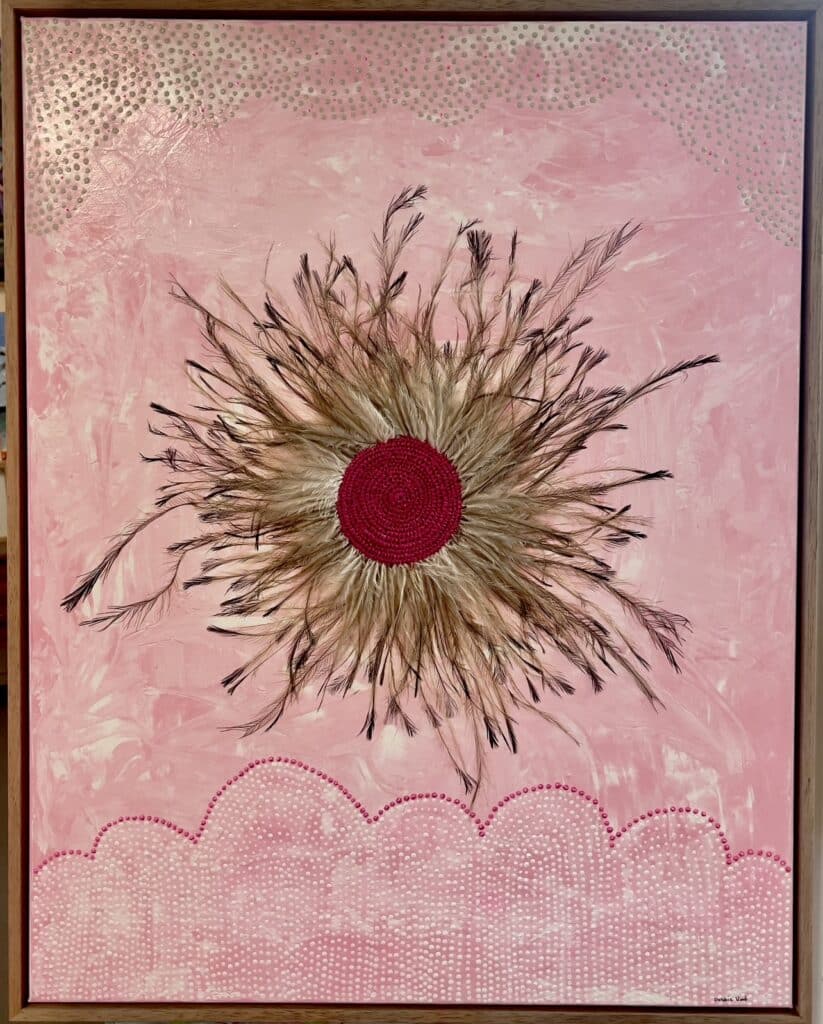 Discover new mixed media works by Gomeroi artist Debbie Wood—woven raffia, emu feathers, and paint unite in stunning cultural storytelling.