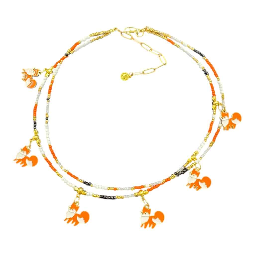 Handmade “Foxy Lady” necklace with enamel fox charms and golden accents — playful, nostalgic, and perfectly cheeky.